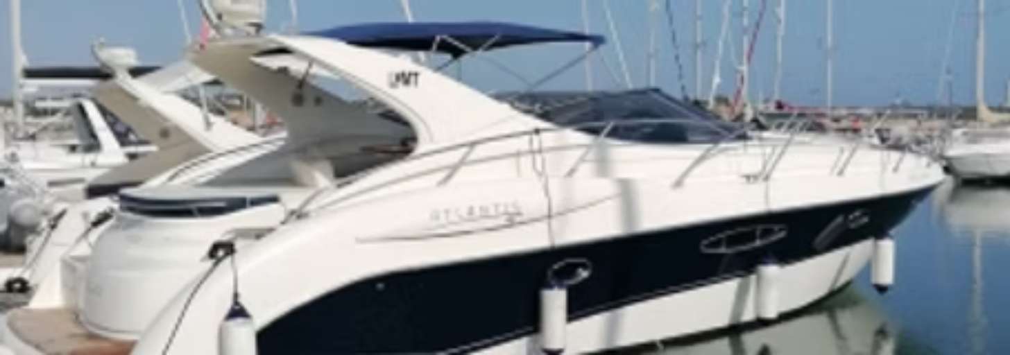 A small luxury yachty pictured in a port